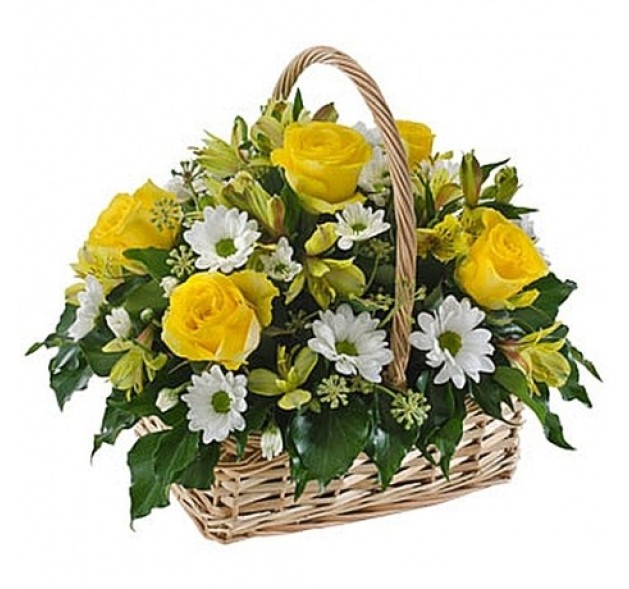 Σύνθεση σε καλάθι σε κίτρινες αποχρώσεις 